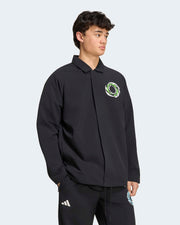 Black collared jacket with a circular green and white chest graphic, modelled for the Lights On collection.