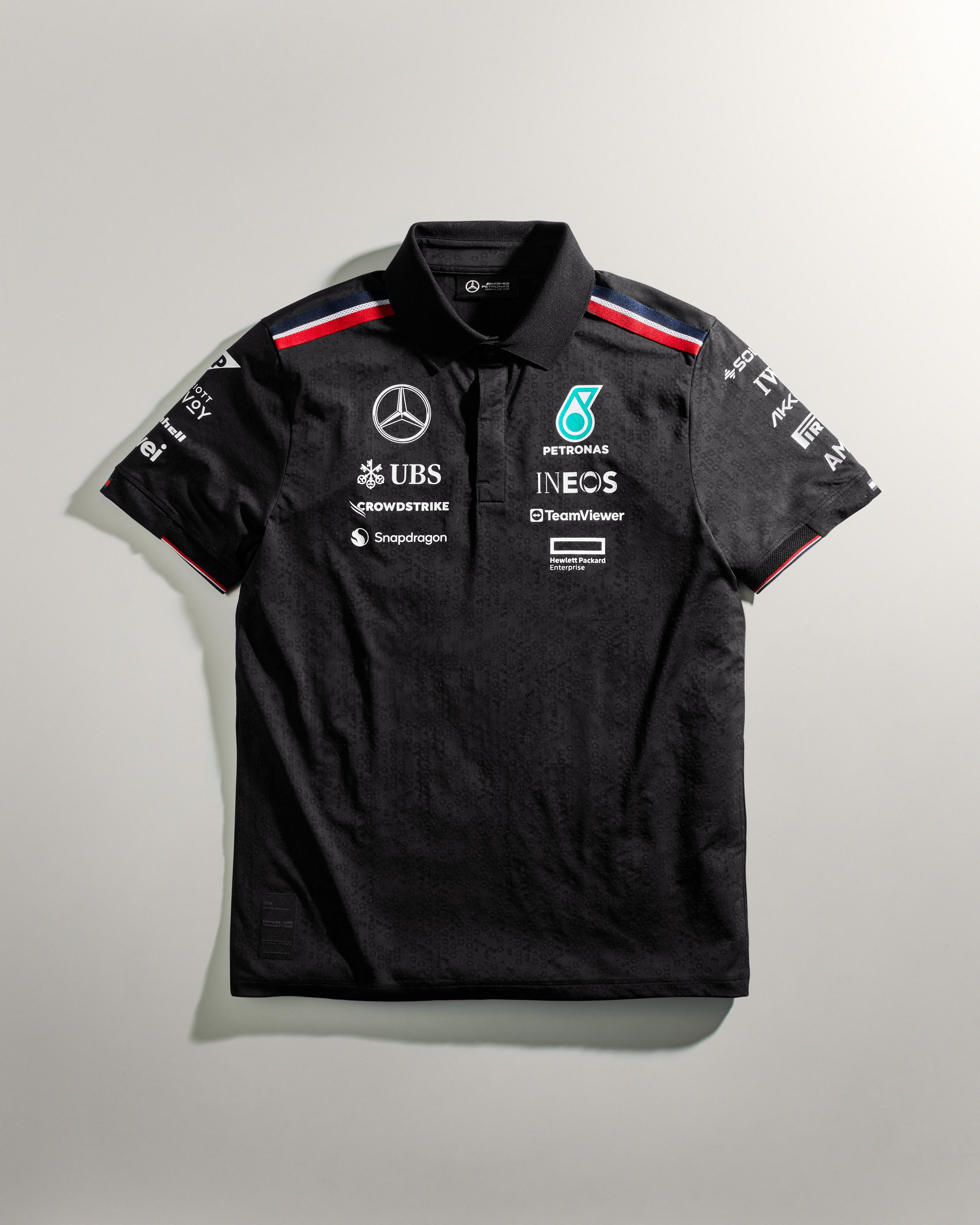 Mens 2024 Team Polo Black Official Mercedes AMG PETRONAS F1 Team Store